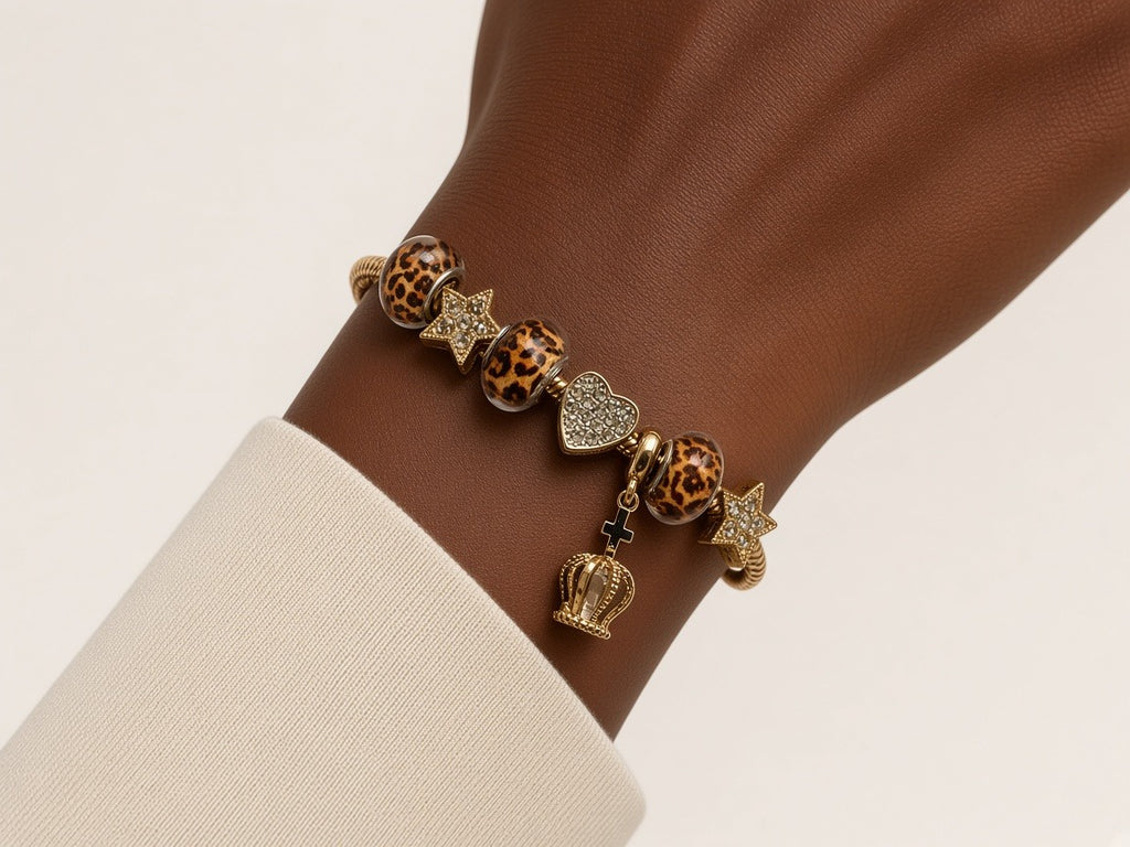 Charm bracelet - leopard print charms - gold worn by a model