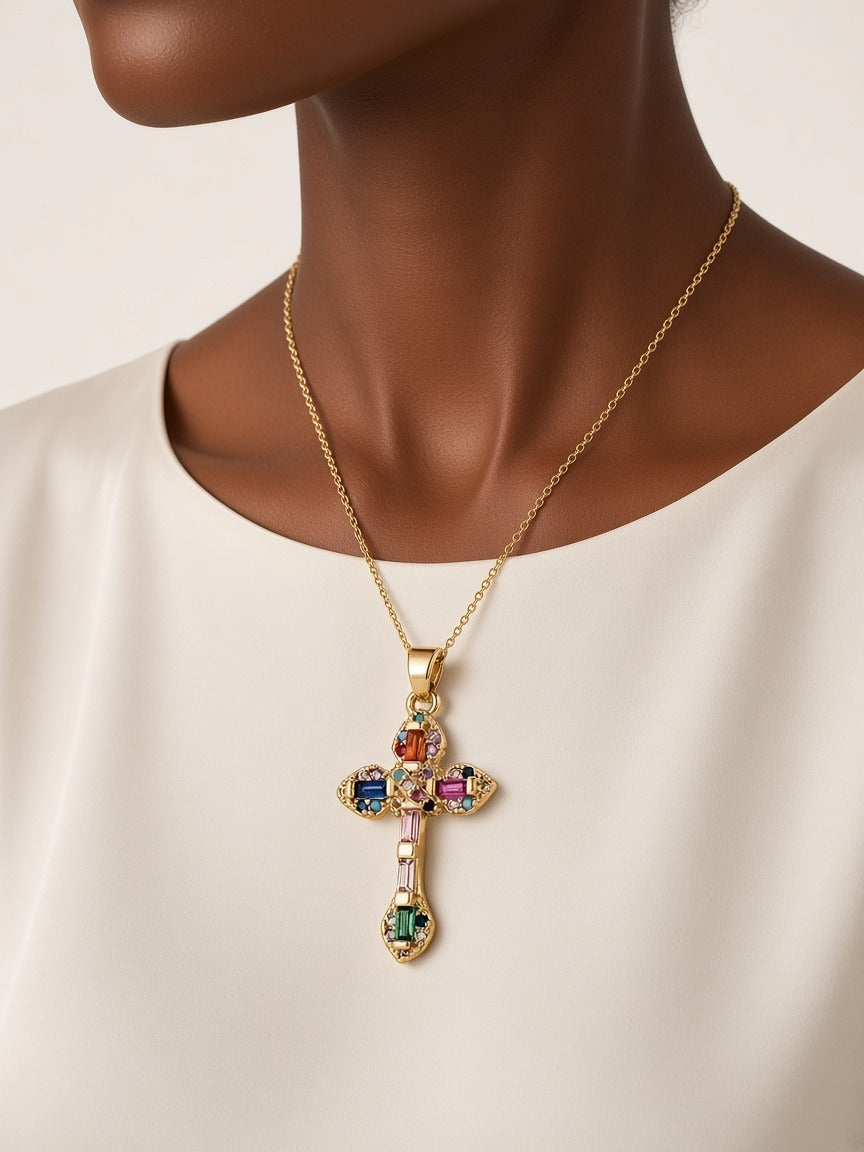Color cross with rhinestones necklace worn by a model