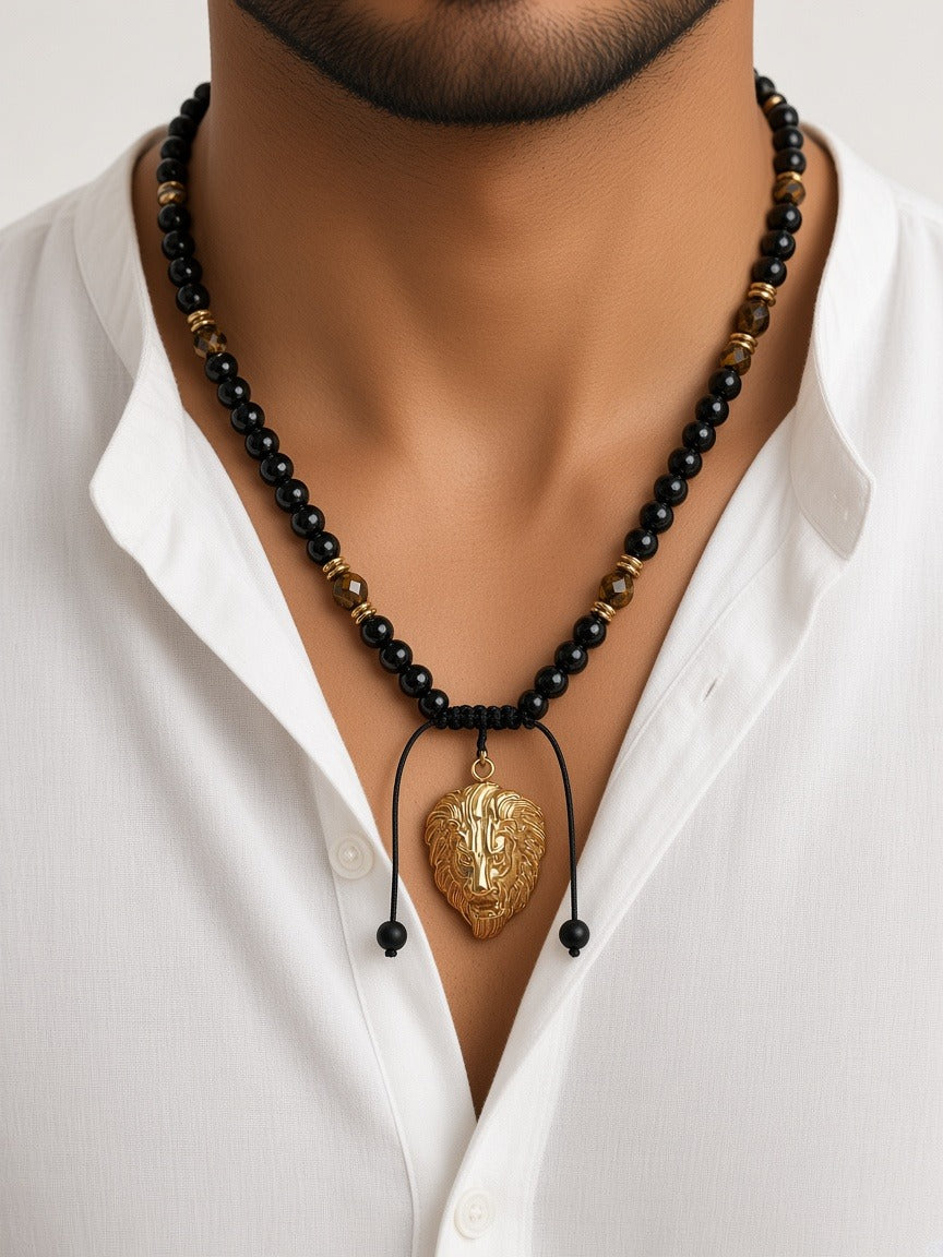 Necklace - beads, gold lion face worn by a model