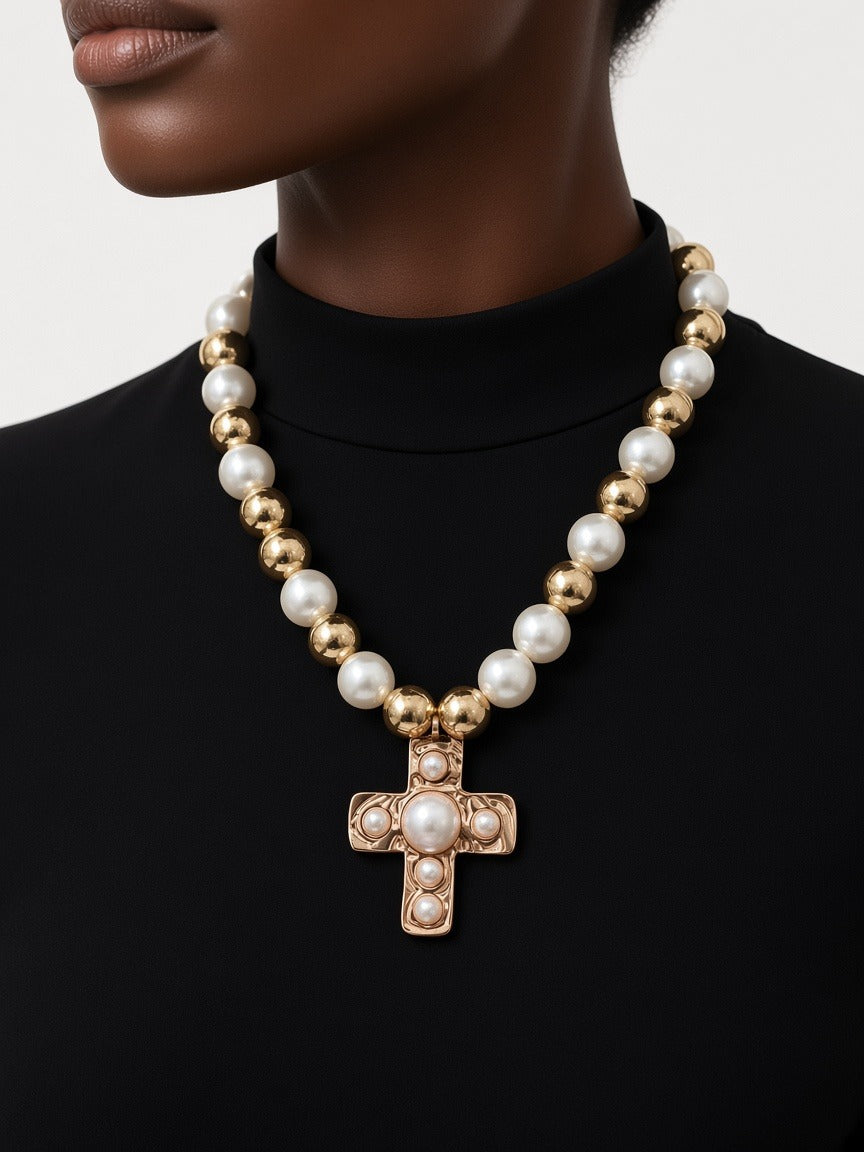 Necklace - big pearl and gold beads with cross worn by a model