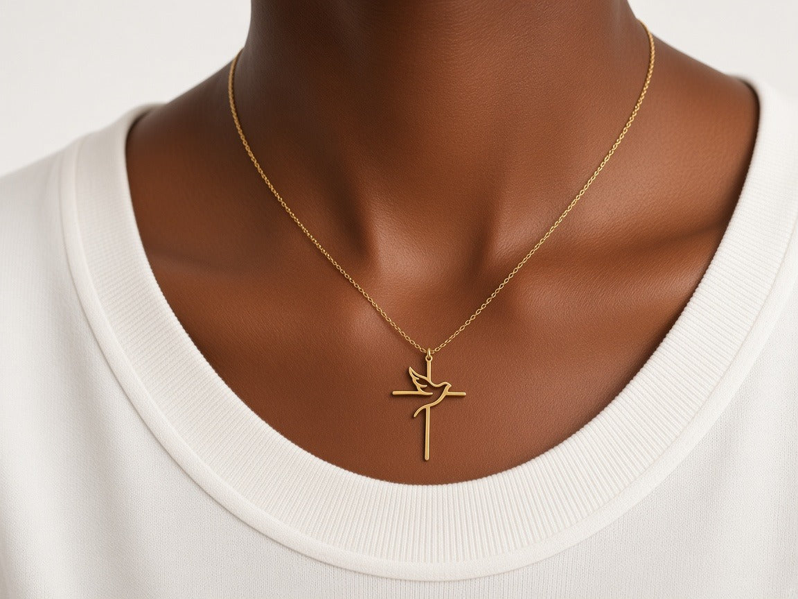 Necklace - dove and cross - gold worn by a model