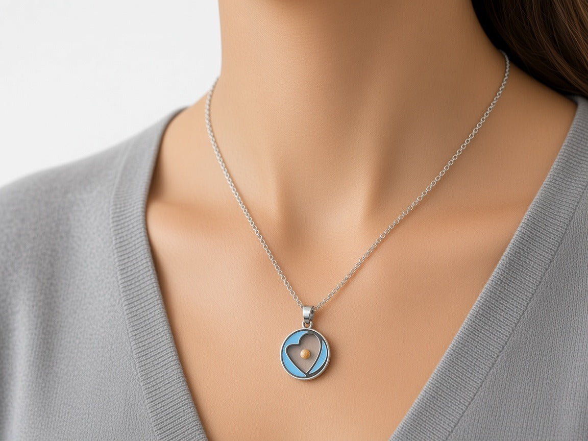 Necklace - Mustard seed heart silver necklace worn by a model