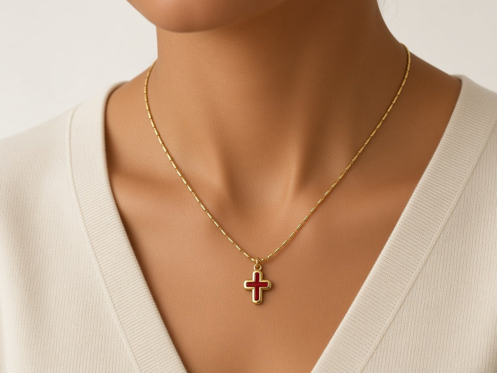 Necklace - small cross gold red or green center of the cross worn by a model