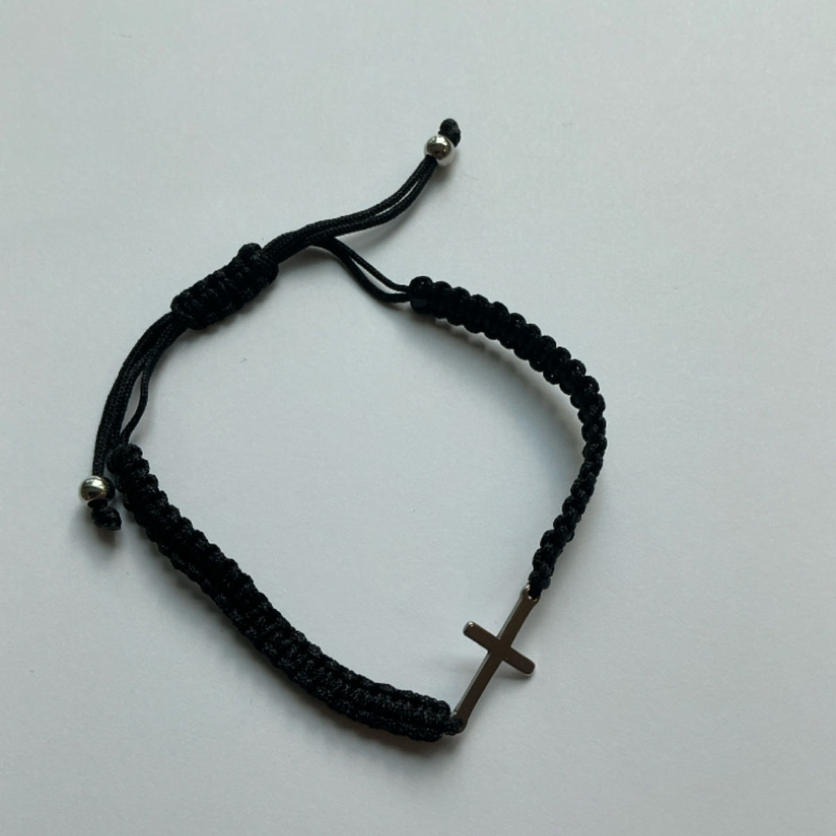 Bracelet - black - braided cross